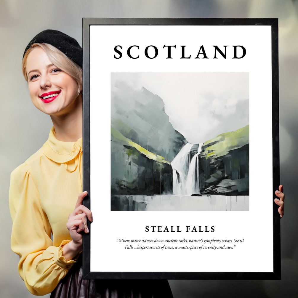 Person holding a poster of Steall Falls