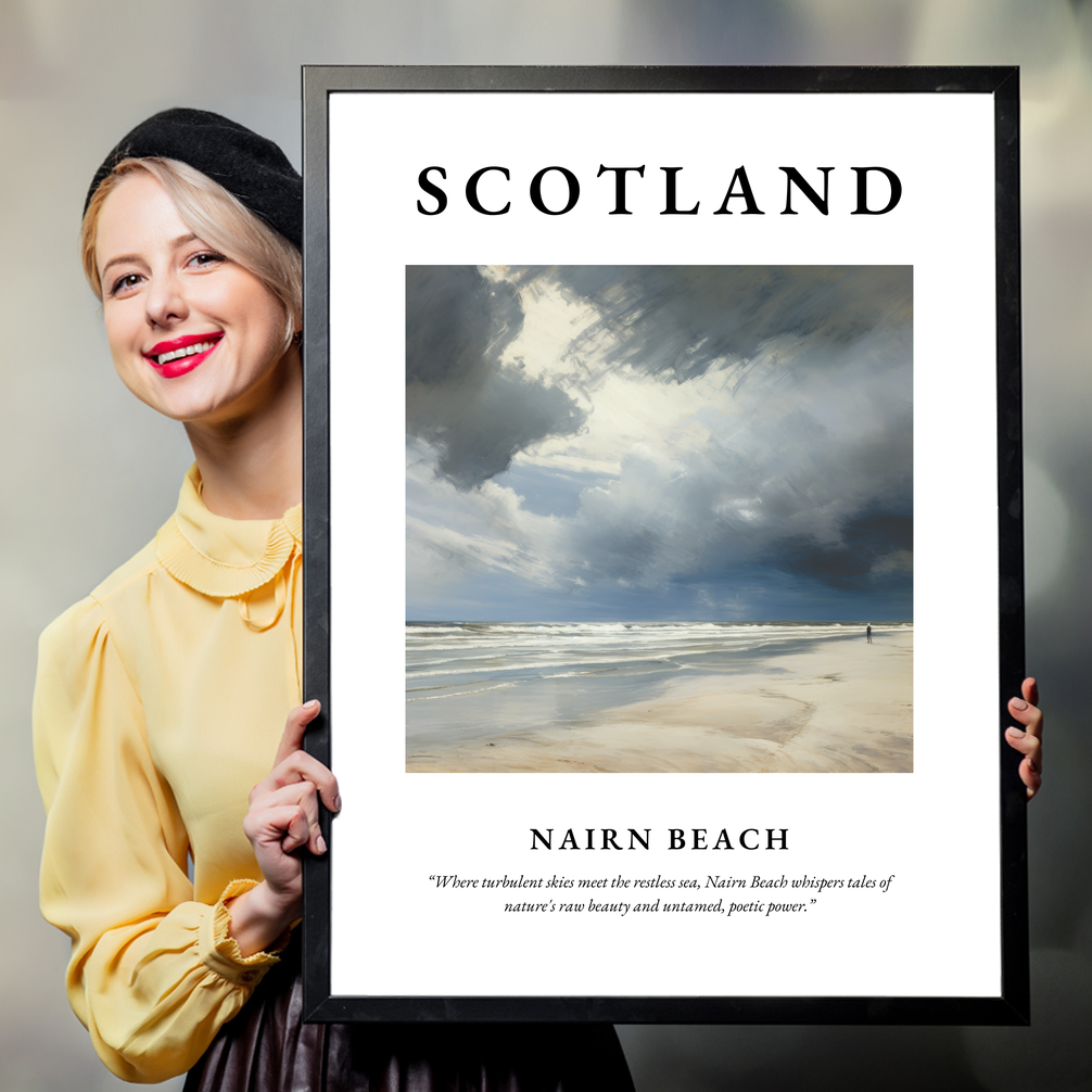 Person holding a poster of Nairn Beach