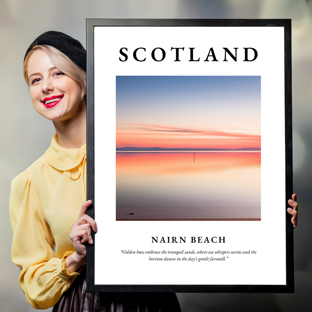 Person holding a poster of Nairn Beach