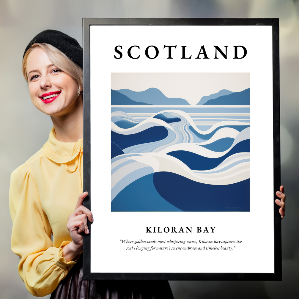 Person holding a poster of Kiloran Bay