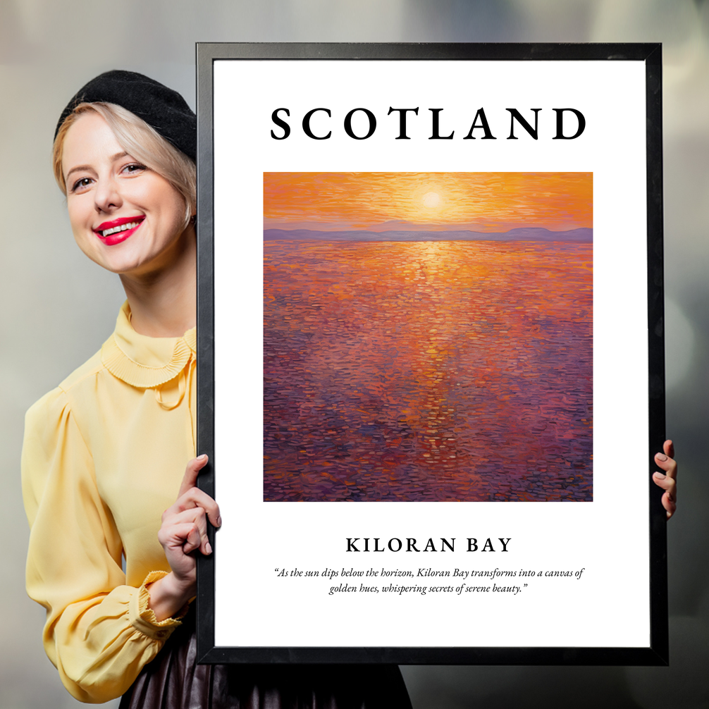 Person holding a poster of Kiloran Bay