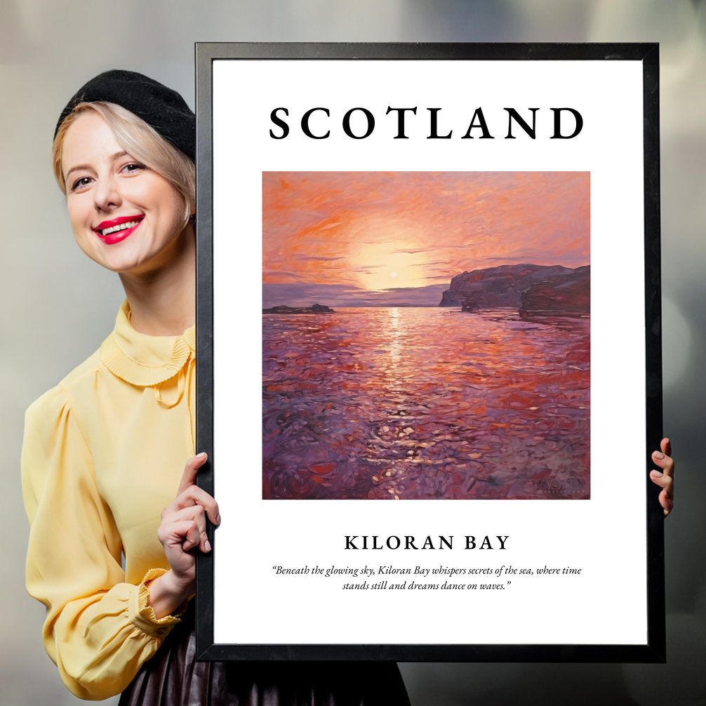 Person holding a poster of Kiloran Bay