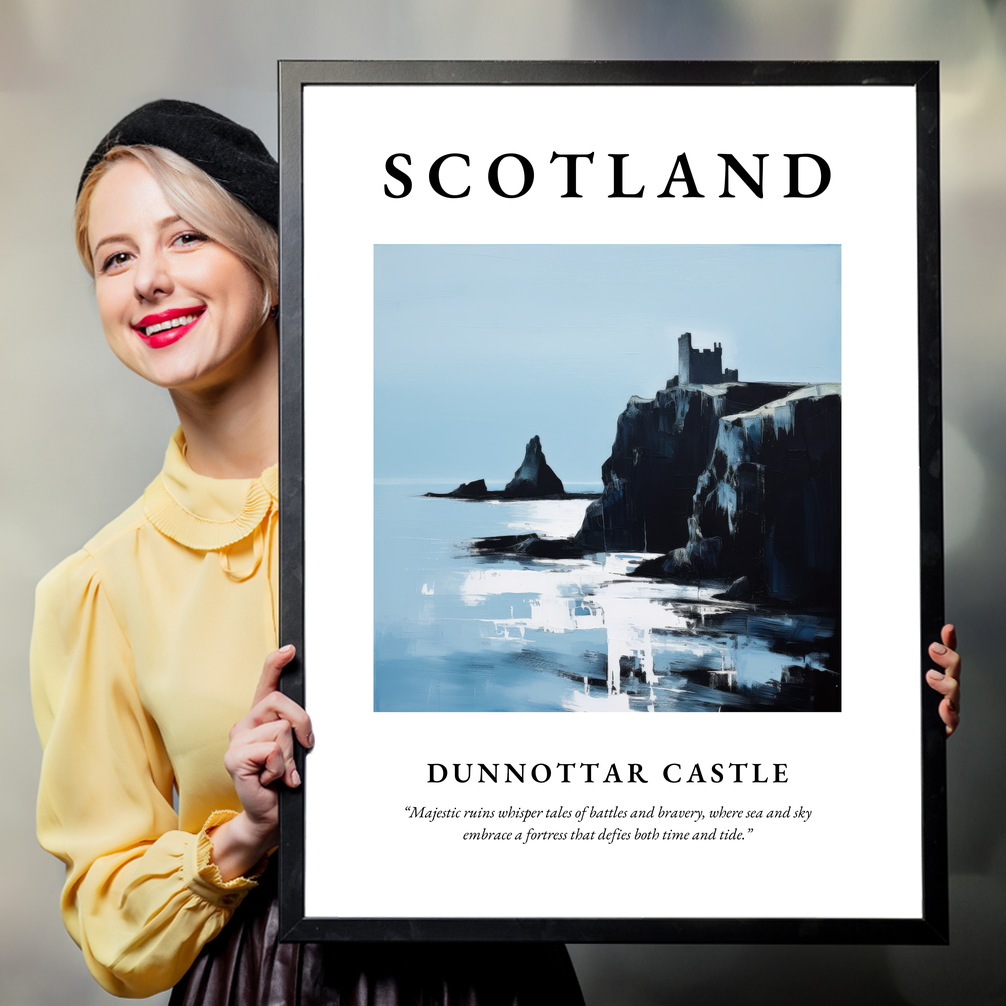 Person holding a poster of Dunnottar Castle