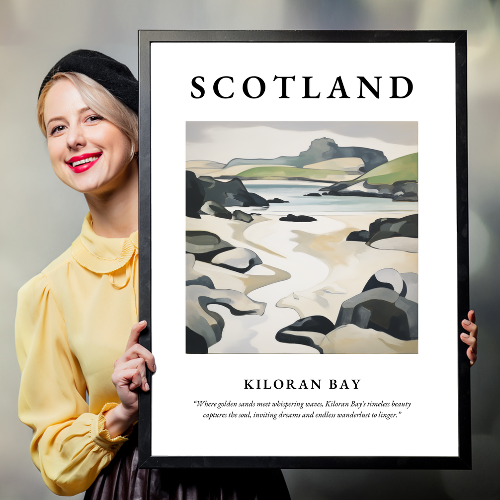 Person holding a poster of Kiloran Bay