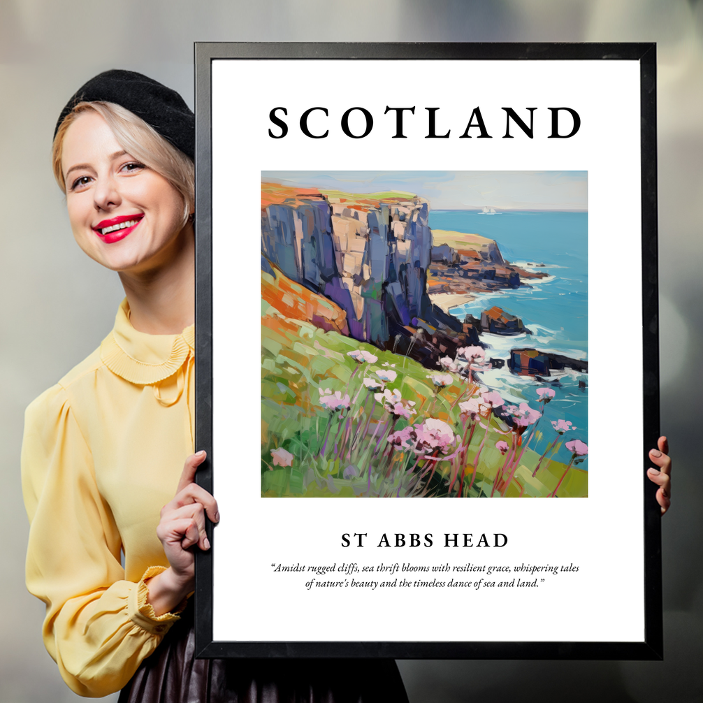 Person holding a poster of St Abbs Head