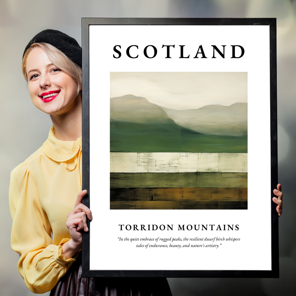 Person holding a poster of Torridon Mountains