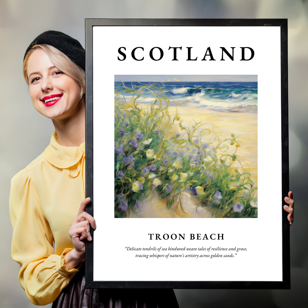 Person holding a poster of Troon Beach