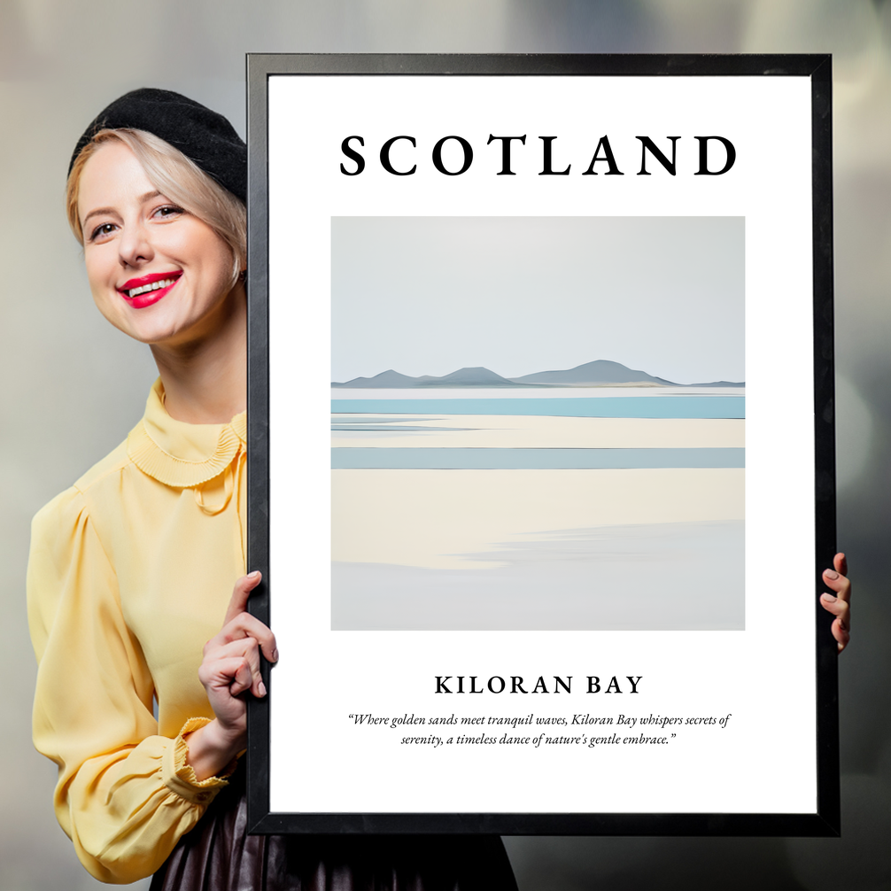 Person holding a poster of Kiloran Bay