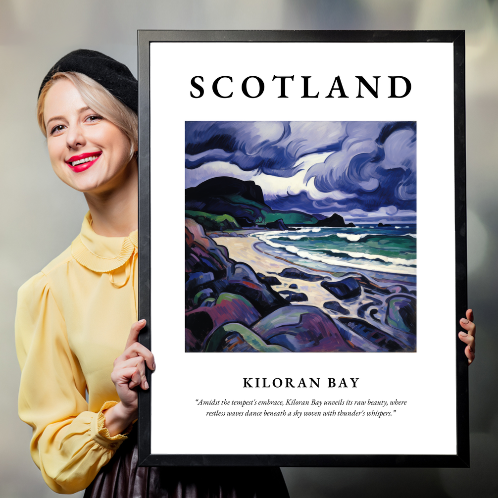 Person holding a poster of Kiloran Bay