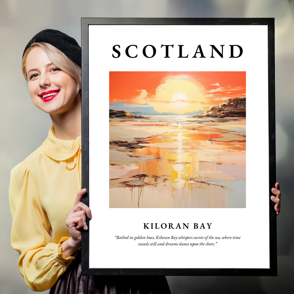 Person holding a poster of Kiloran Bay