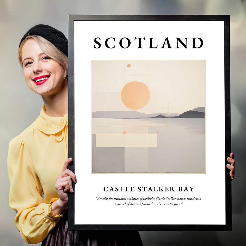 Person holding a poster of Castle Stalker Bay