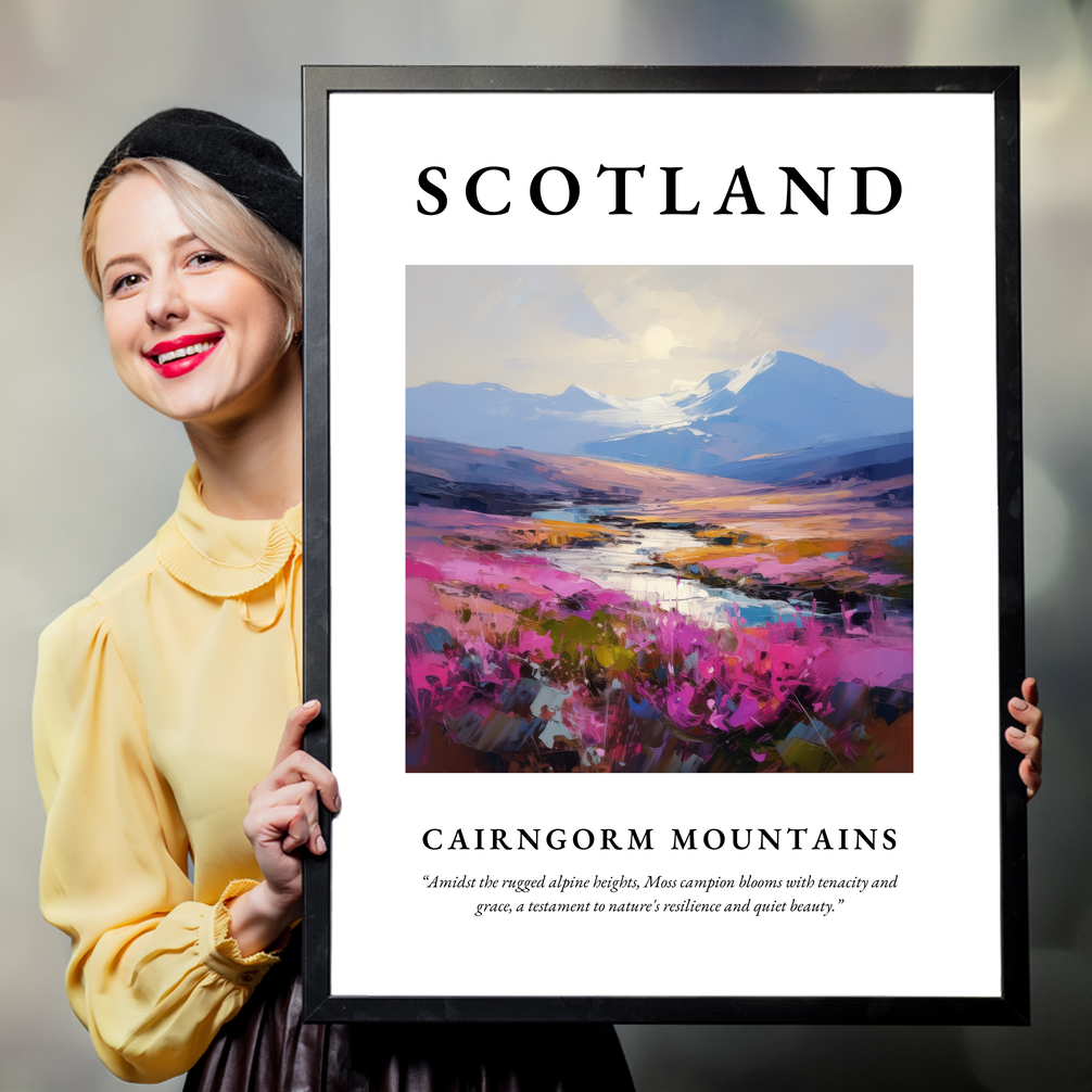 Person holding a poster of Cairngorm Mountains