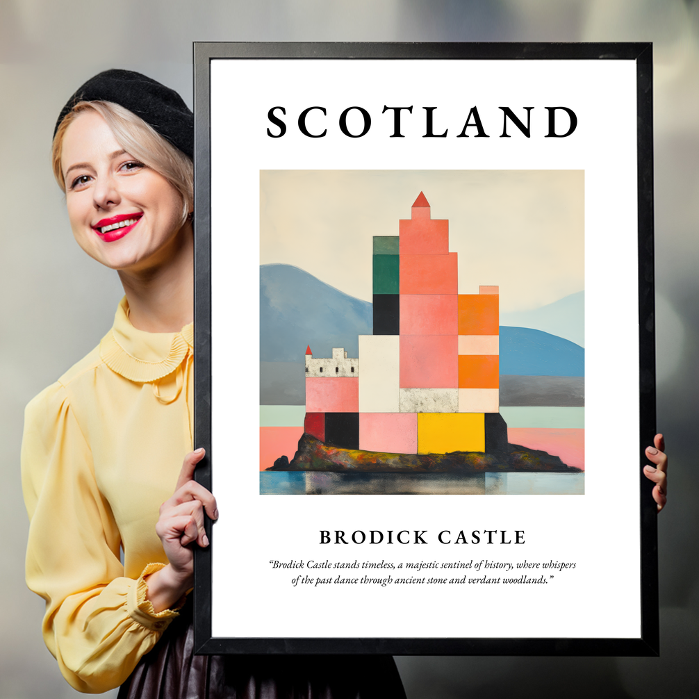 Person holding a poster of Brodick Castle