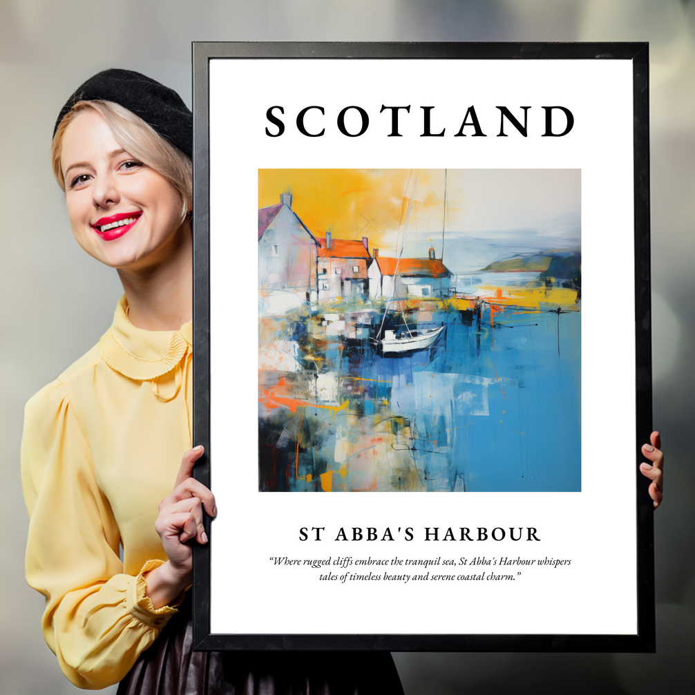 Person holding a poster of St Abba's Harbour