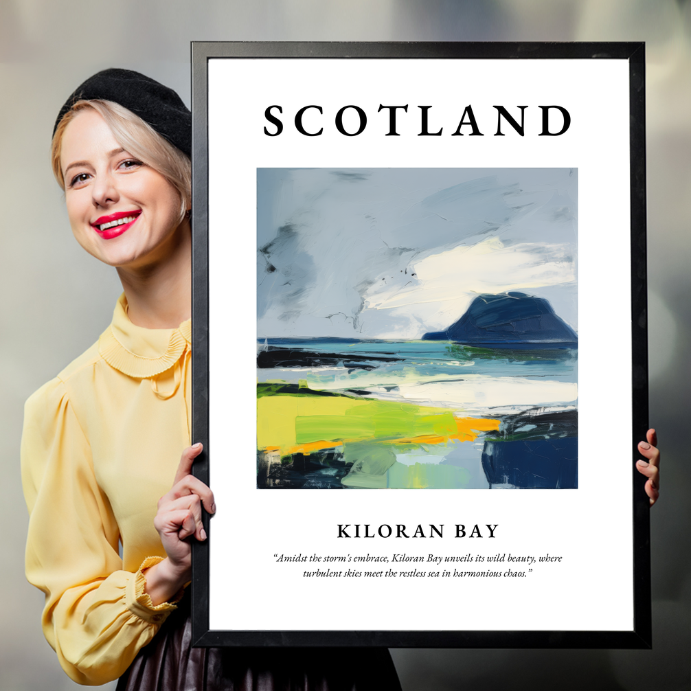 Person holding a poster of Kiloran Bay