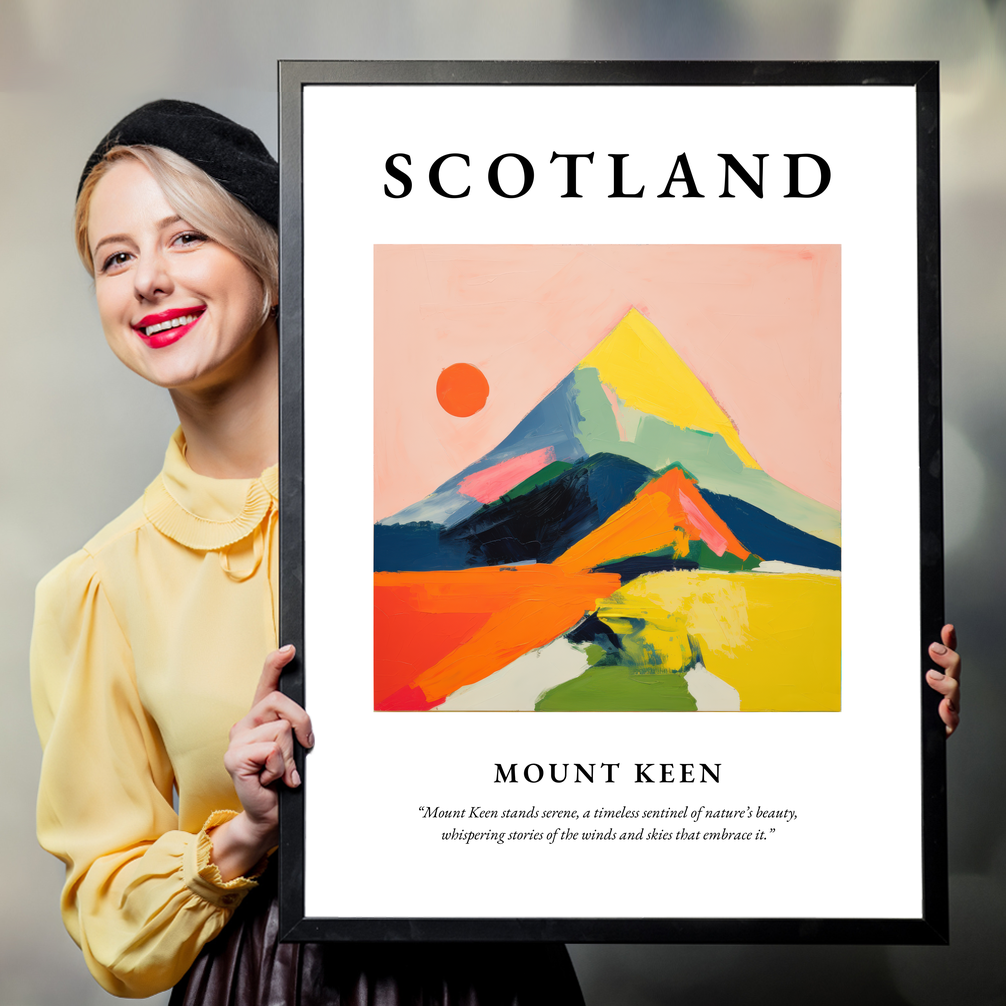 Person holding a poster of Mount Keen