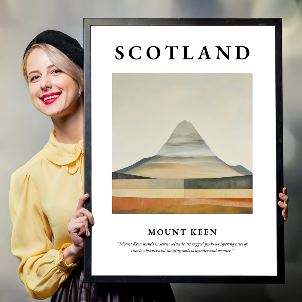 Person holding a poster of Mount Keen