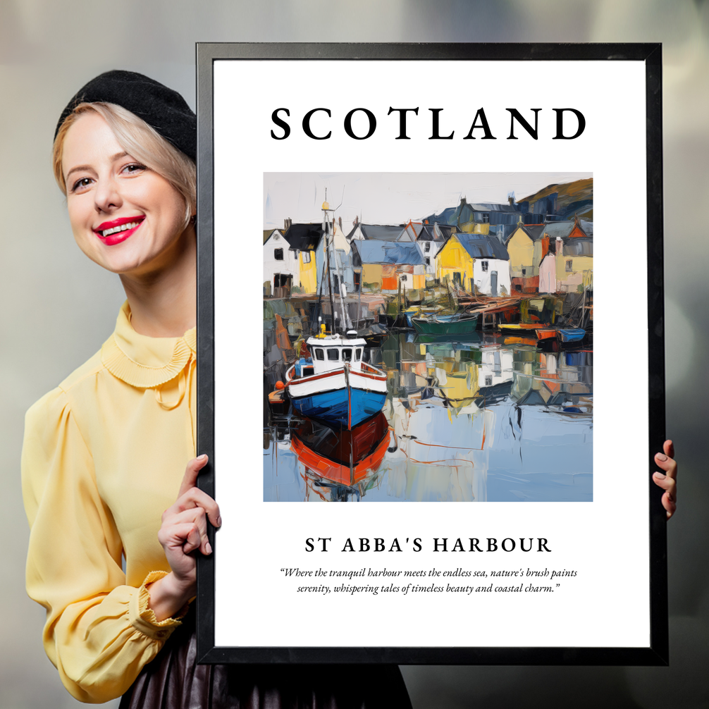 Person holding a poster of St Abba's Harbour