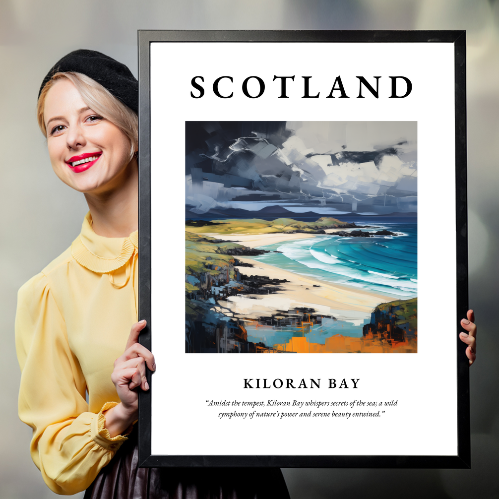 Person holding a poster of Kiloran Bay