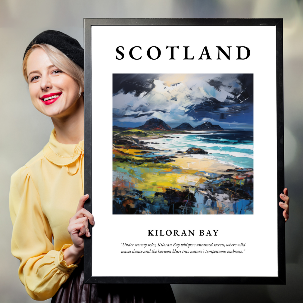 Person holding a poster of Kiloran Bay