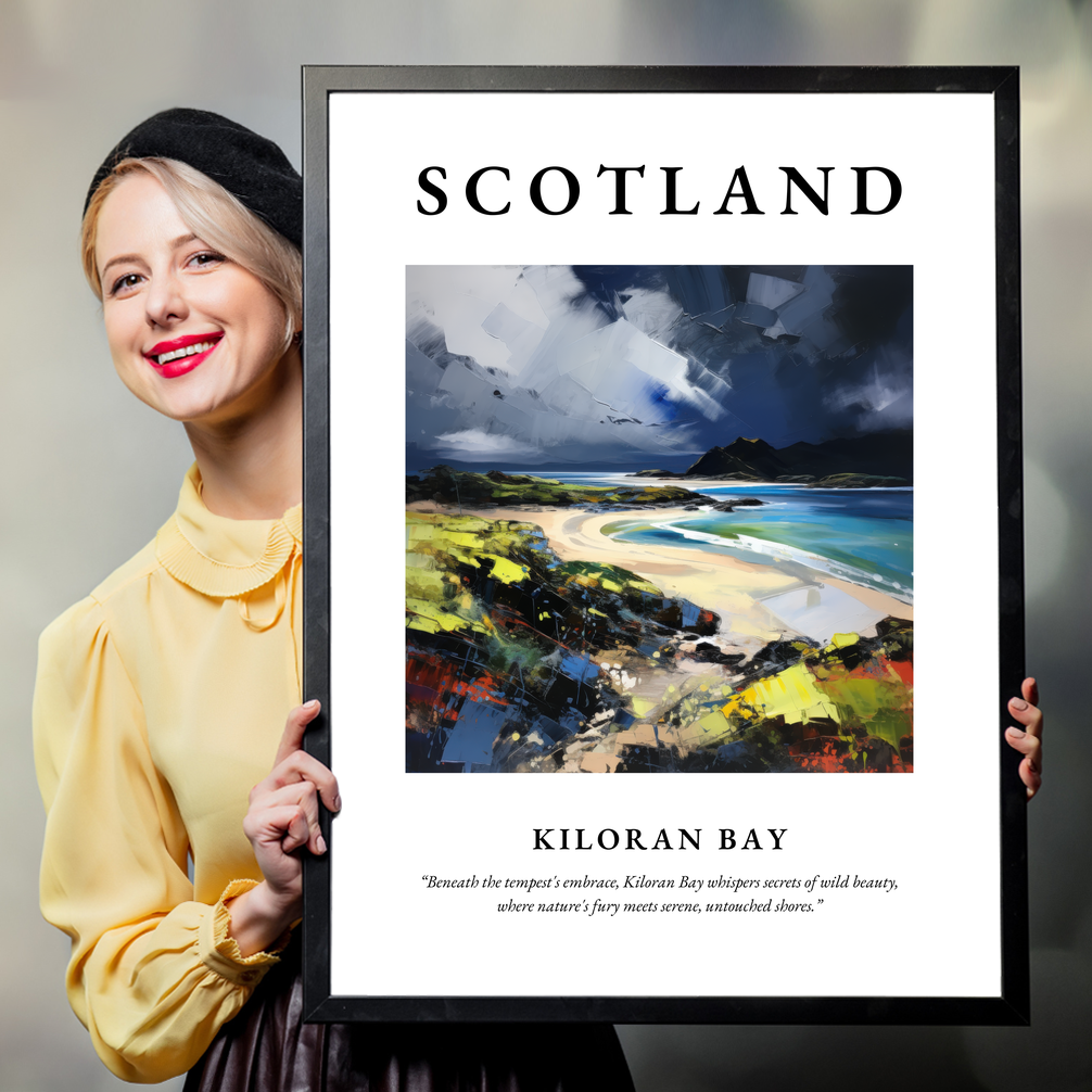 Person holding a poster of Kiloran Bay