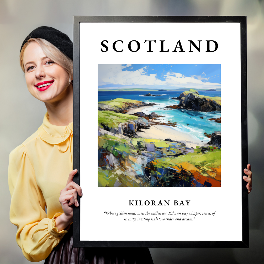 Person holding a poster of Kiloran Bay