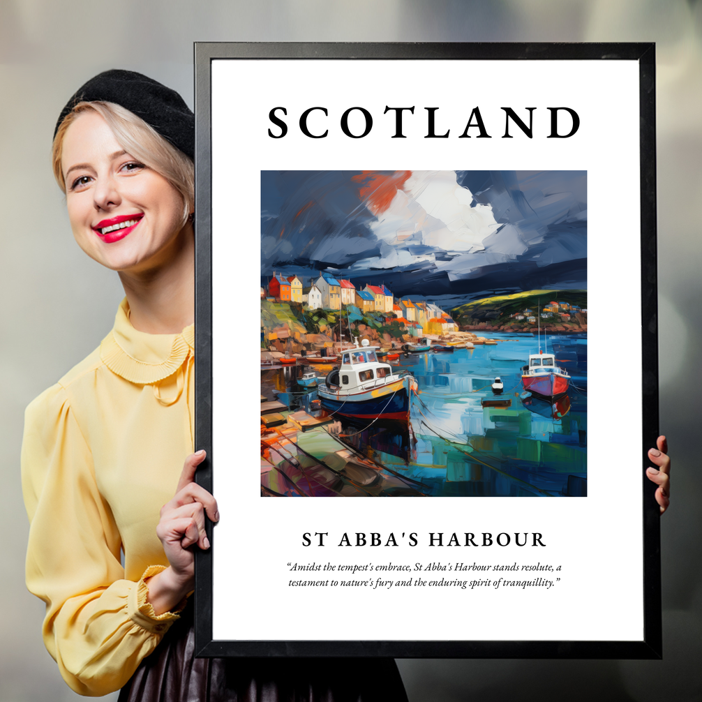 Person holding a poster of St Abba's Harbour