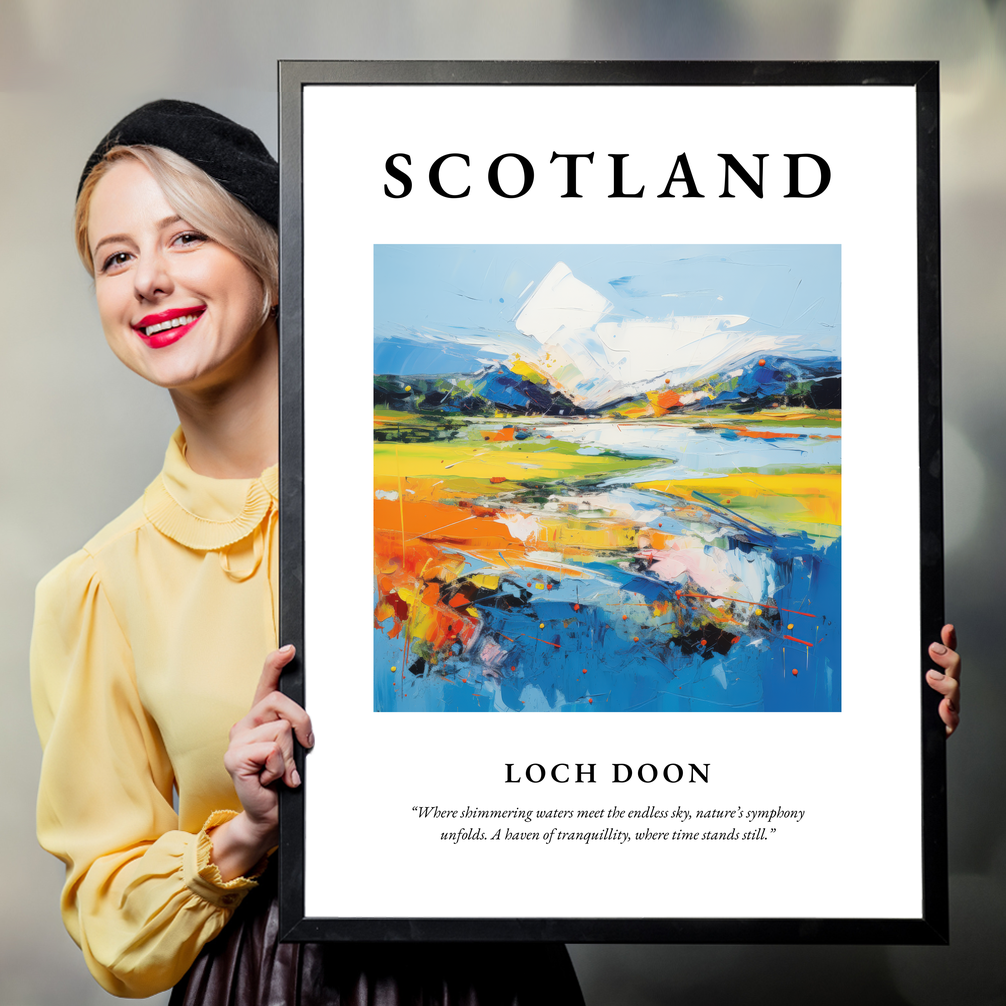 Person holding a poster of Loch Doon