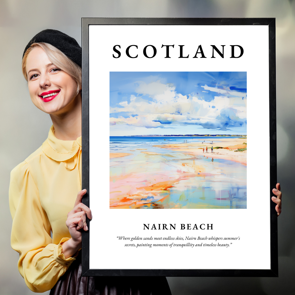 Person holding a poster of Nairn Beach