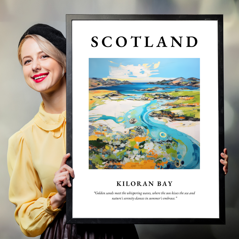 Person holding a poster of Kiloran Bay