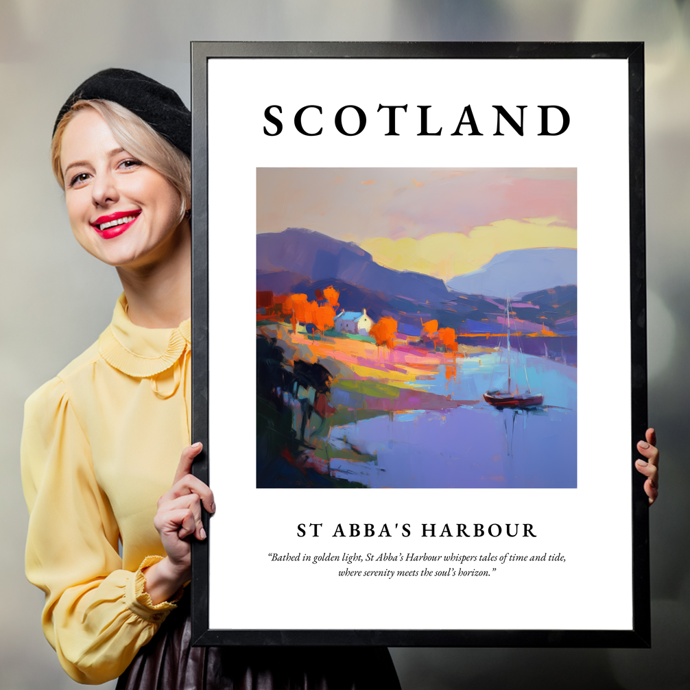 Person holding a poster of St Abba's Harbour