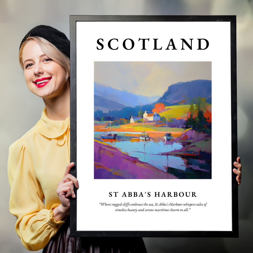 Person holding a poster of St Abba's Harbour