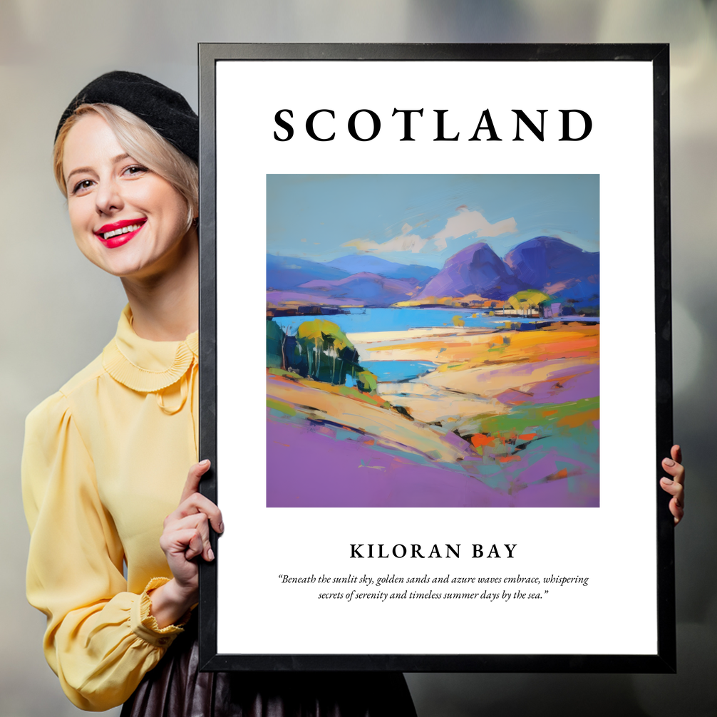 Person holding a poster of Kiloran Bay