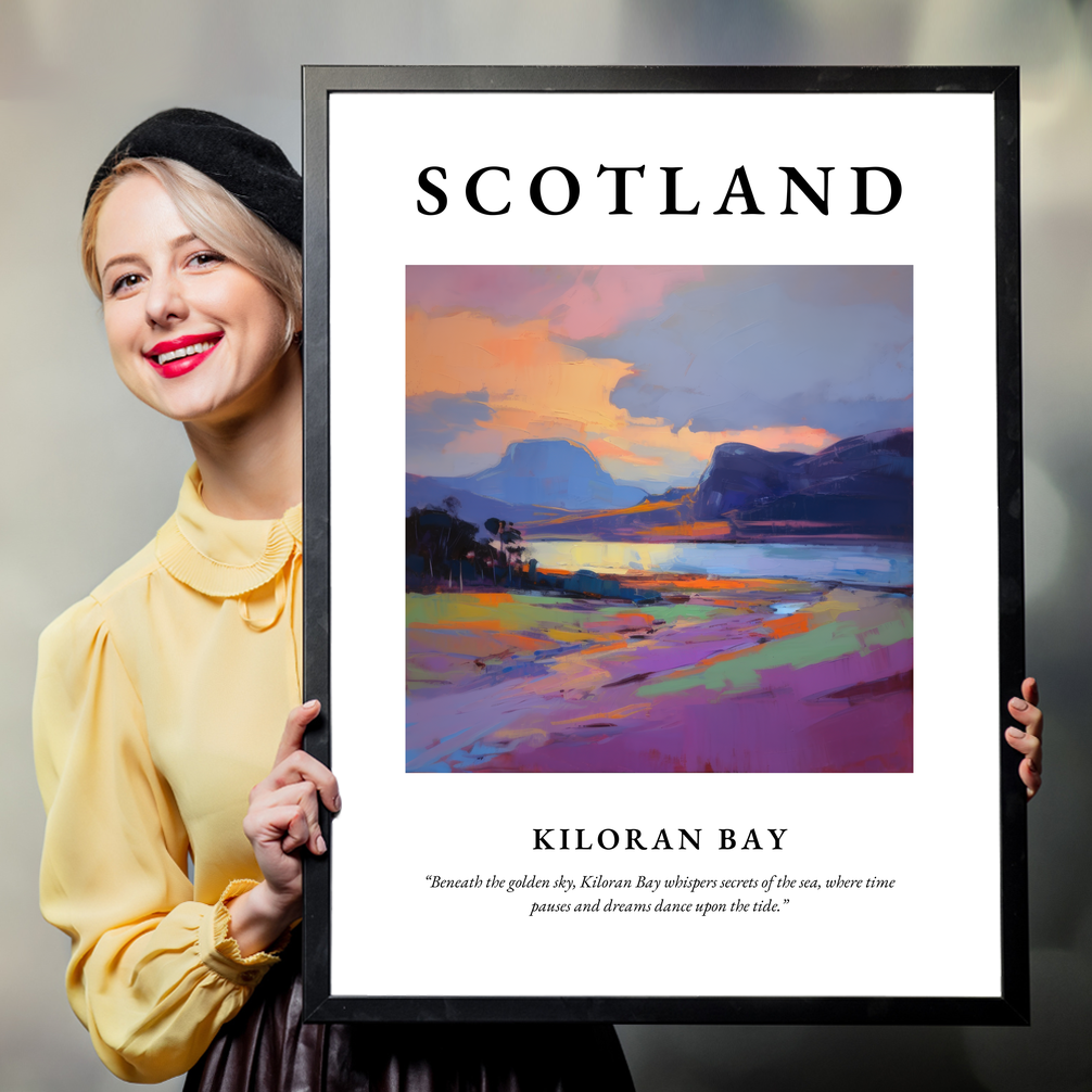 Person holding a poster of Kiloran Bay