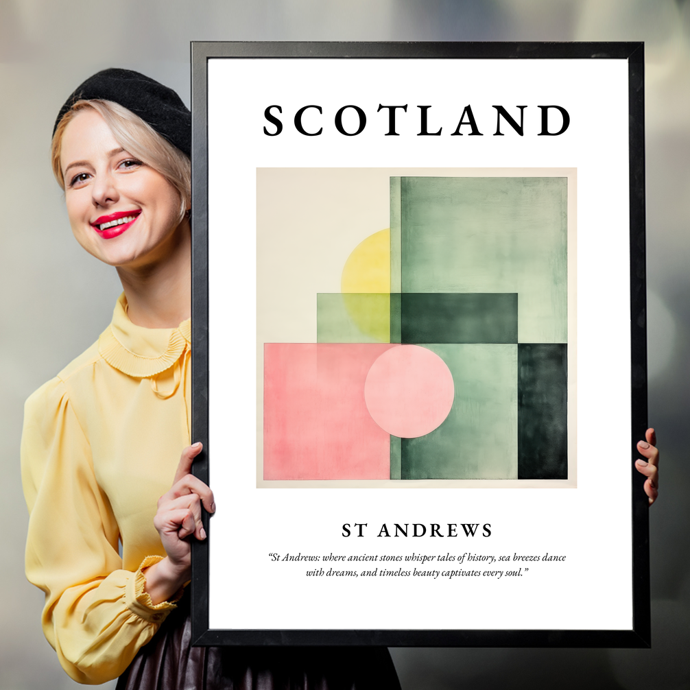 Person holding a poster of St Andrews