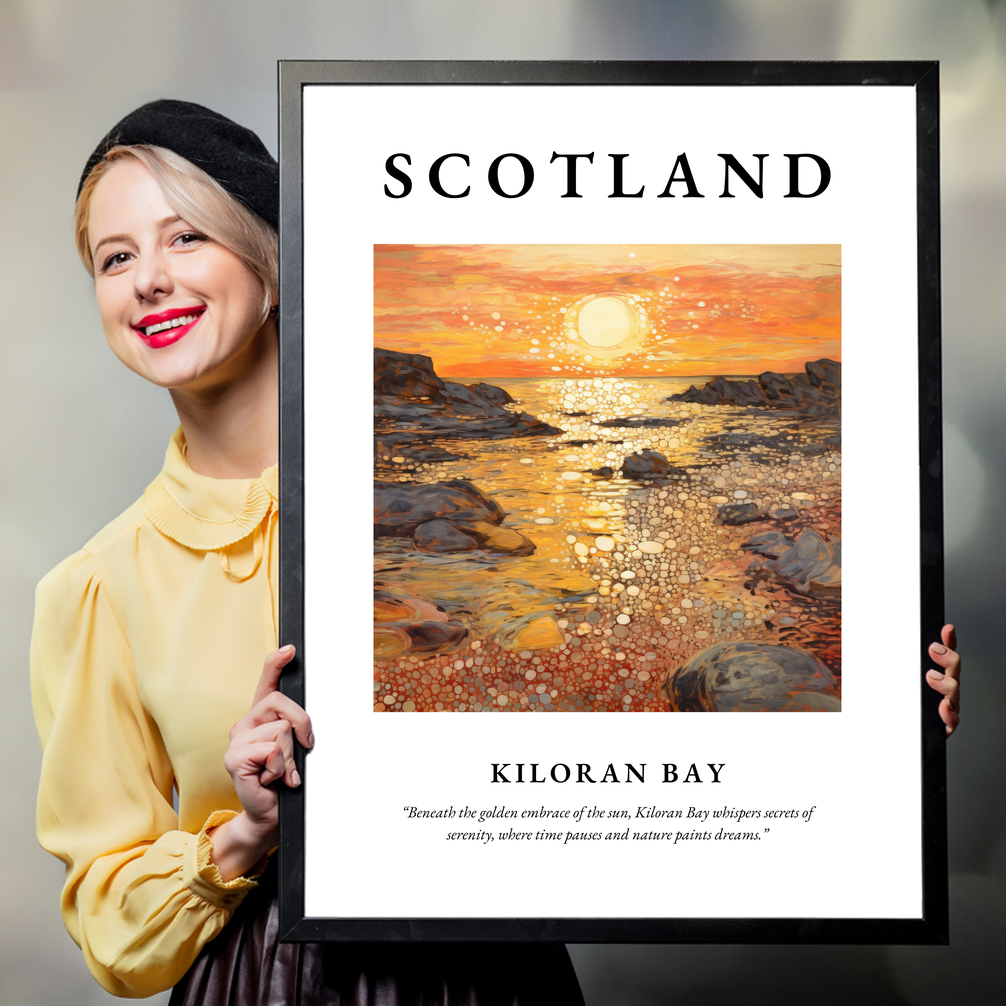 Person holding a poster of Kiloran Bay