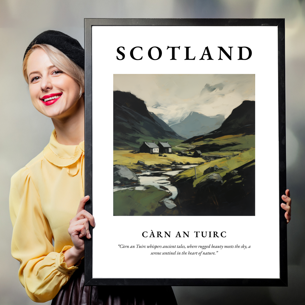 Person holding a poster of Càrn an Tuirc