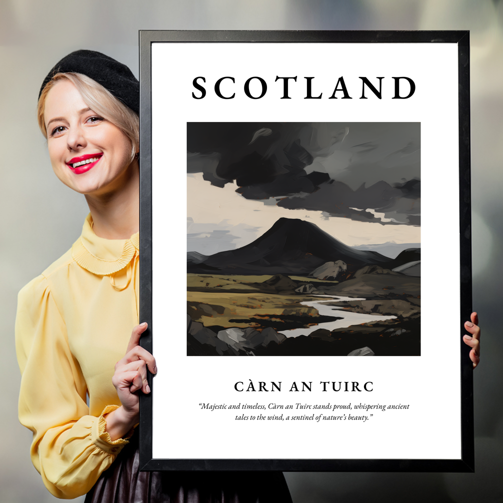 Person holding a poster of Càrn an Tuirc