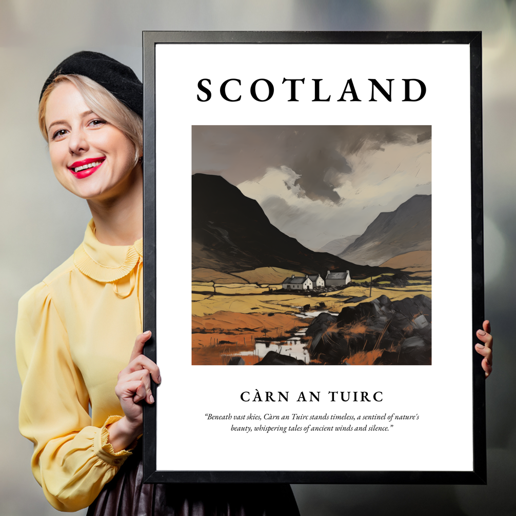 Person holding a poster of Càrn an Tuirc