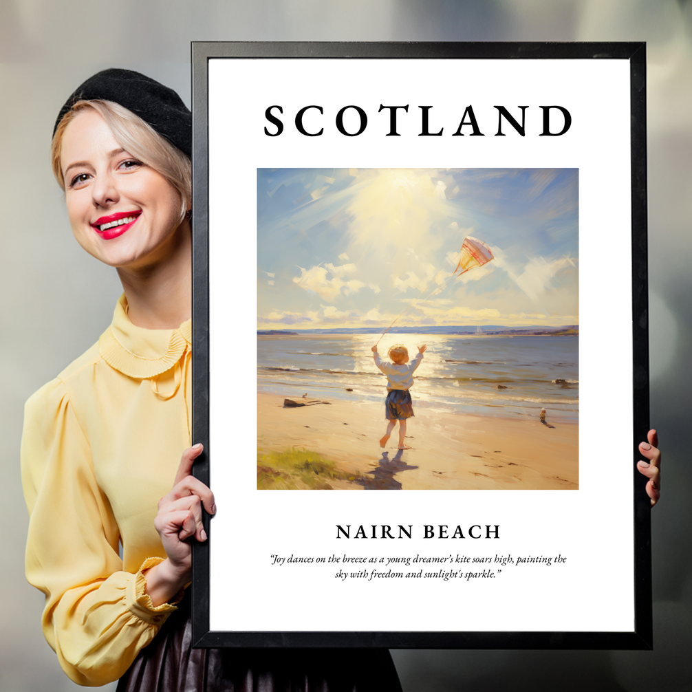 Person holding a poster of Nairn Beach