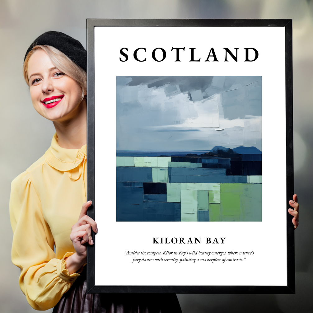 Person holding a poster of Kiloran Bay