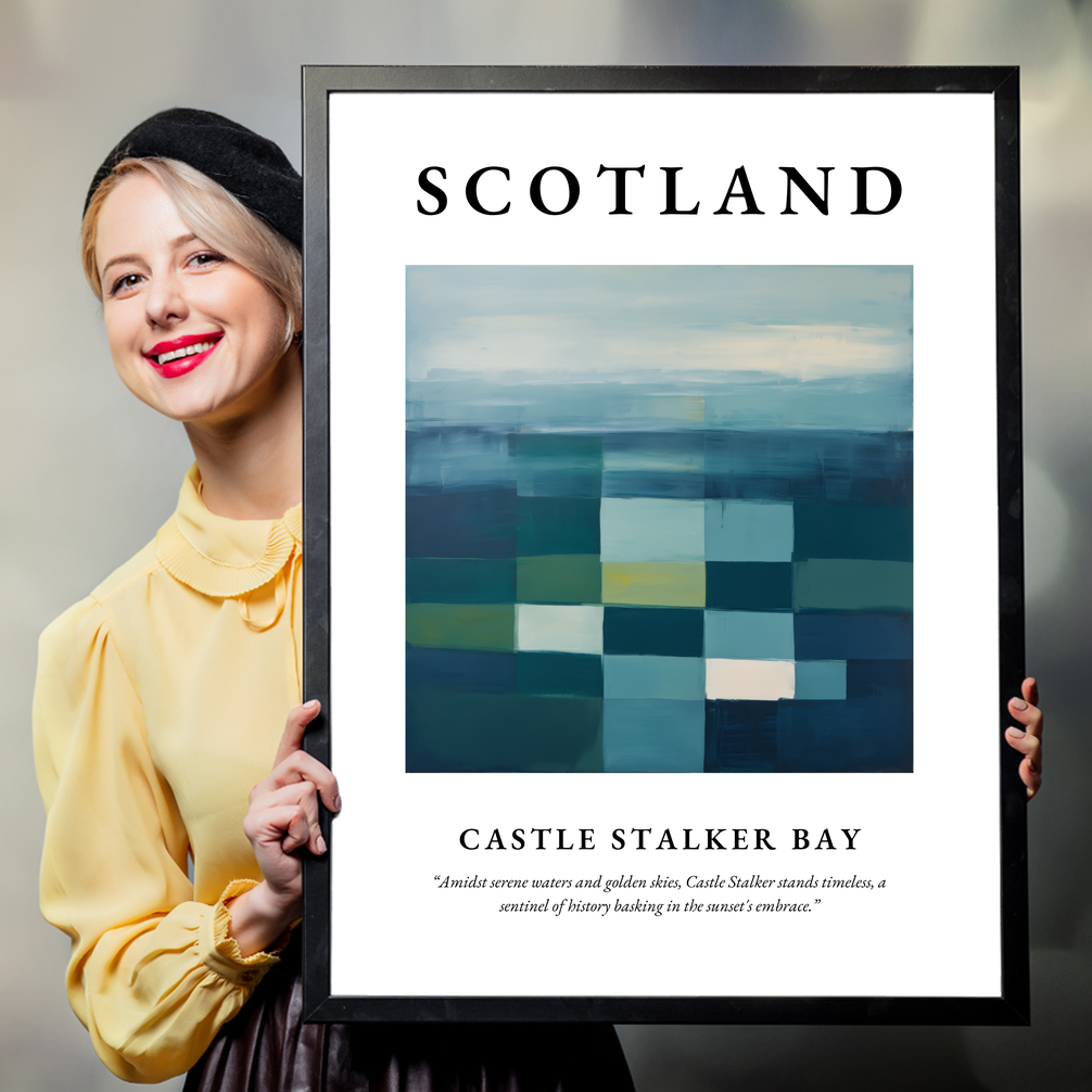 Person holding a poster of Castle Stalker Bay