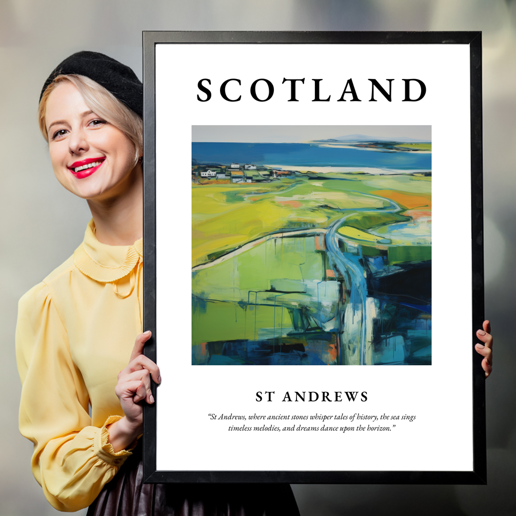 Person holding a poster of St Andrews