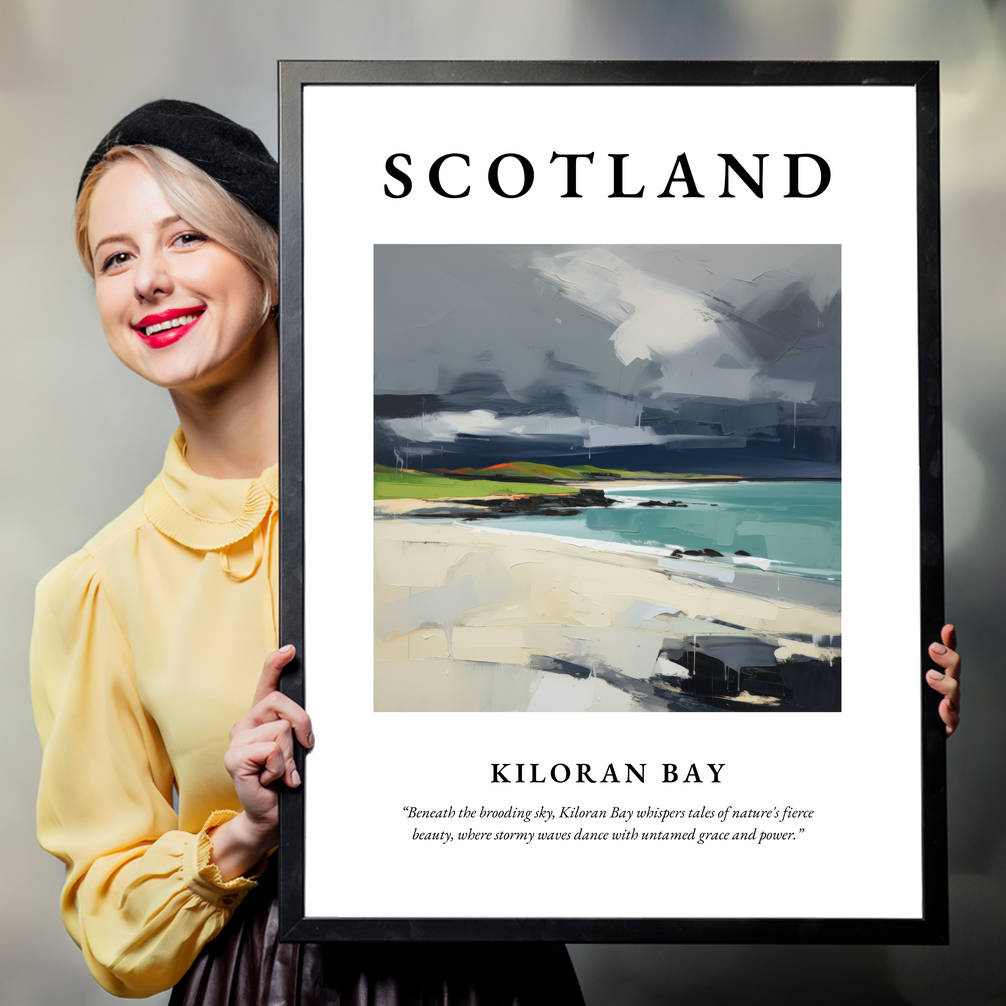 Person holding a poster of Kiloran Bay