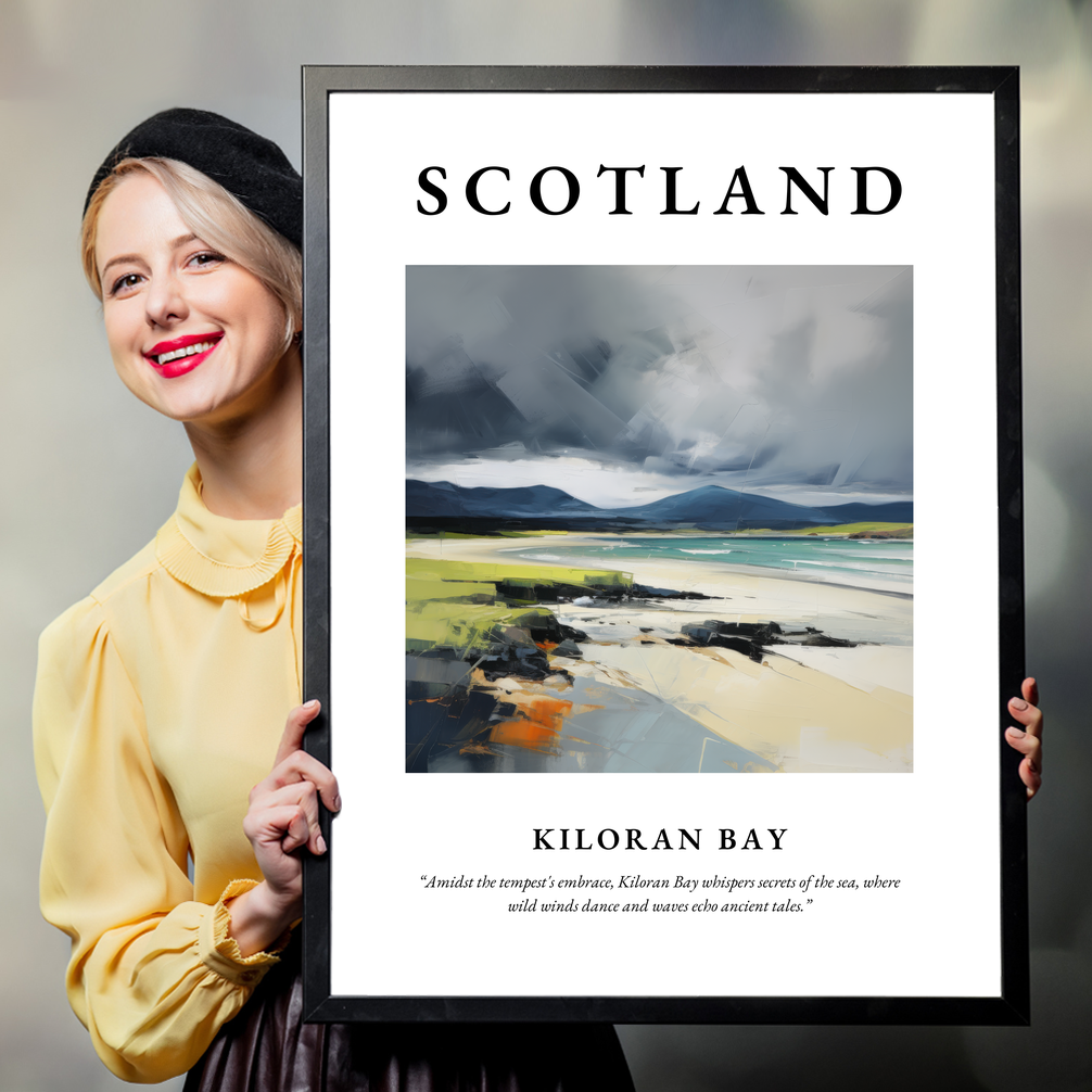 Person holding a poster of Kiloran Bay