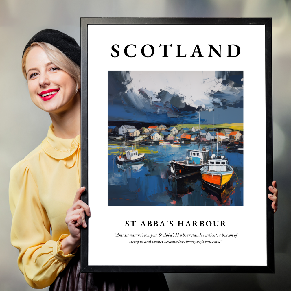 Person holding a poster of St Abba's Harbour