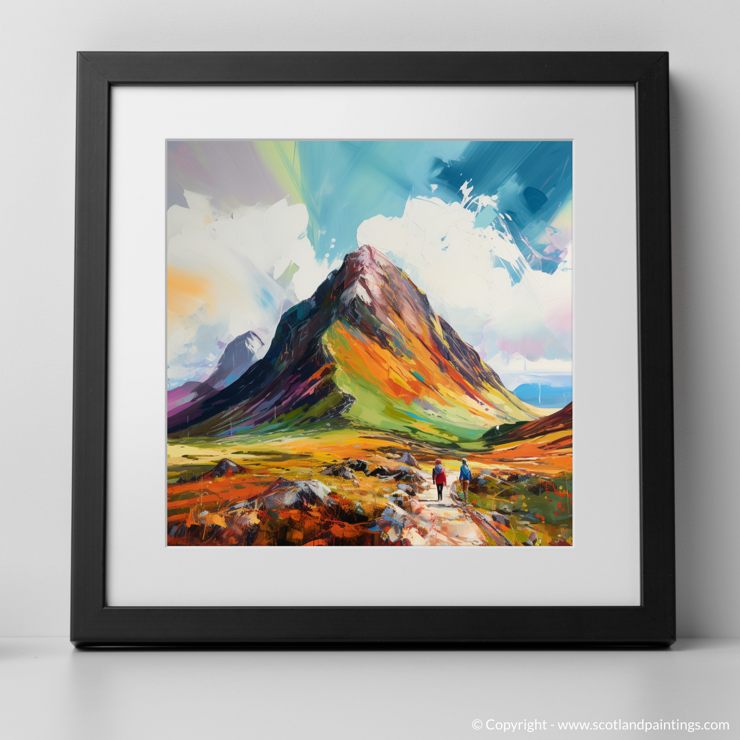 Art Print of Hikers at Buachaille summit in Glencoe with a black frame