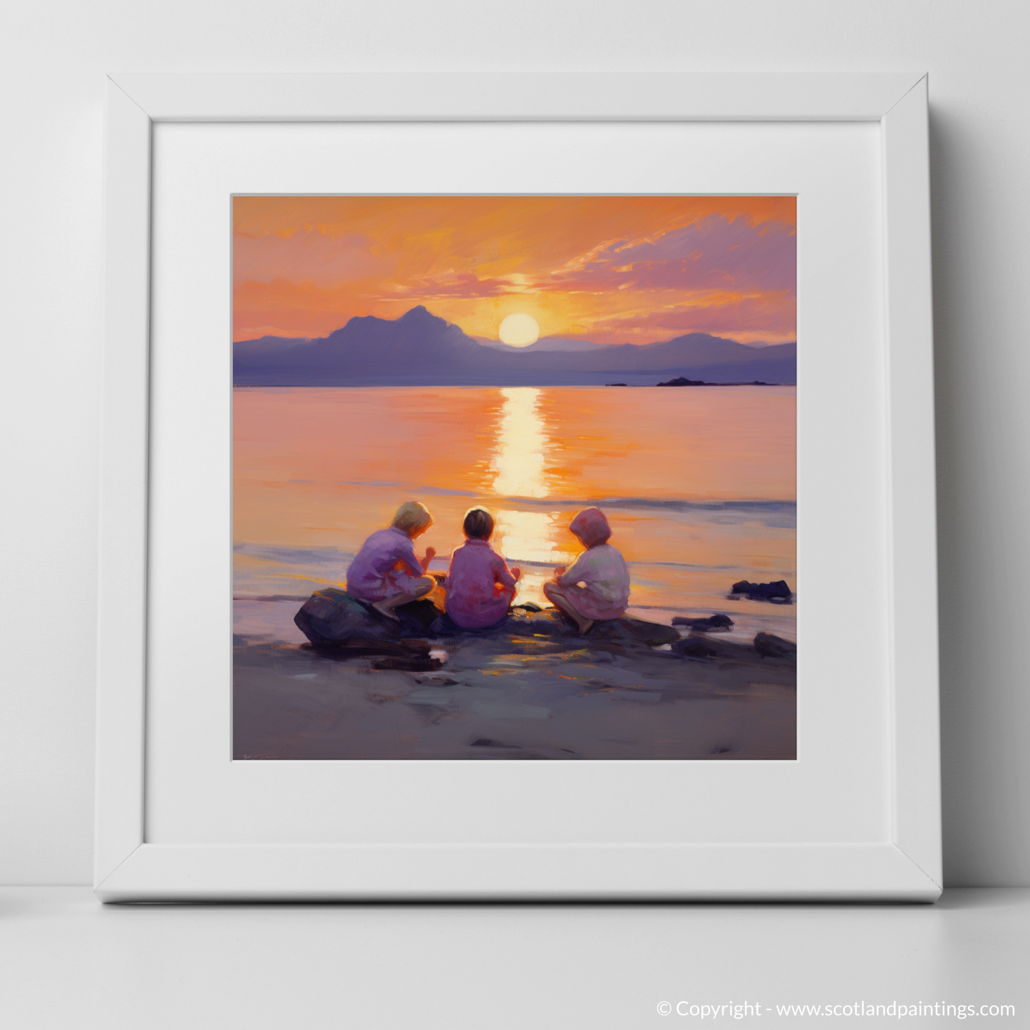 Art Print of Young explorers watching the sunset over the Isle of Arran from the peaceful Saltcoats Beach with a white frame