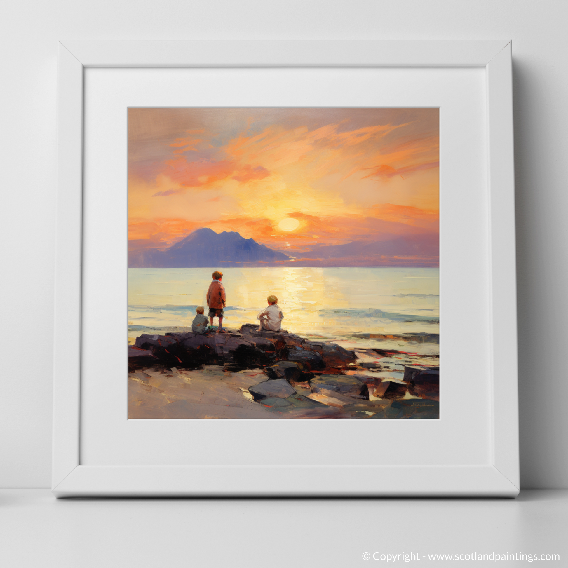 Art Print of Young explorers watching the sunset over the Isle of Arran from the peaceful Saltcoats Beach with a white frame