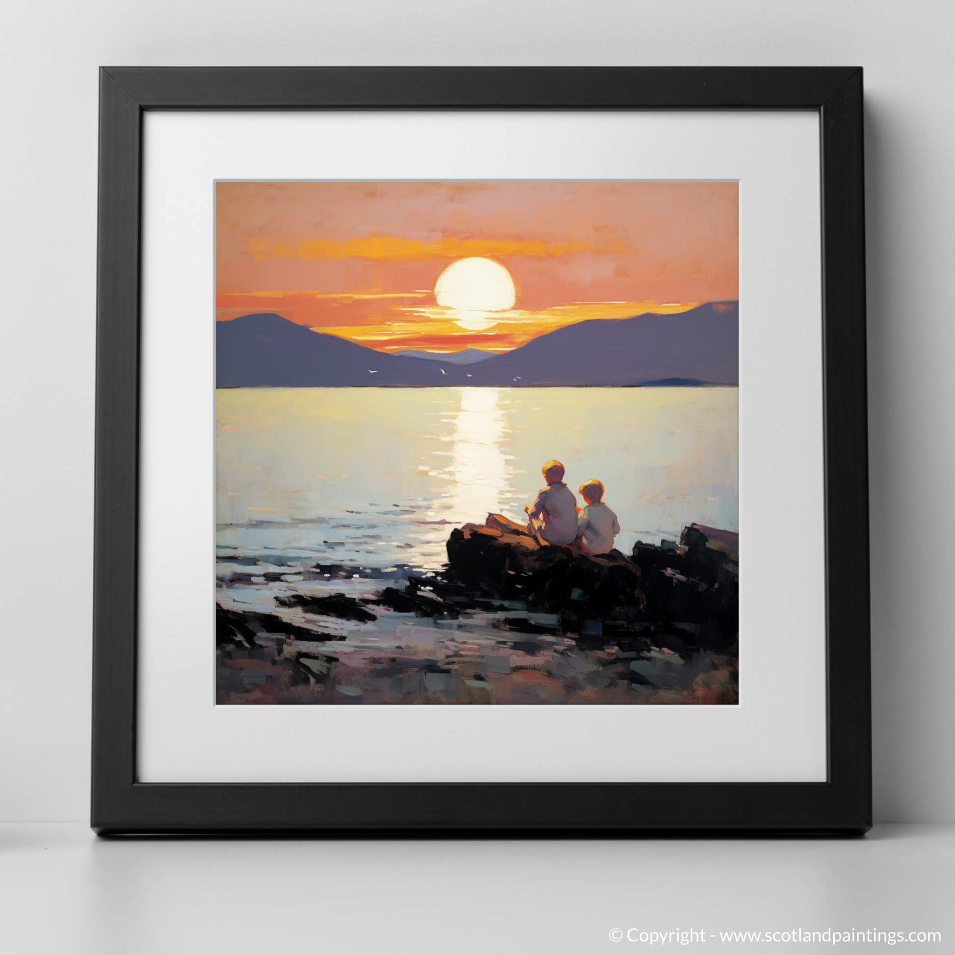 Art Print of Young explorers watching the sunset over the Isle of Arran from the peaceful Saltcoats Beach with a black frame